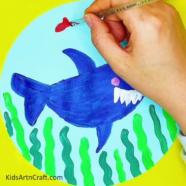 Make small fish with red poster colour- Get A Detailed Tutorial On Shark Painting Step-by-Step