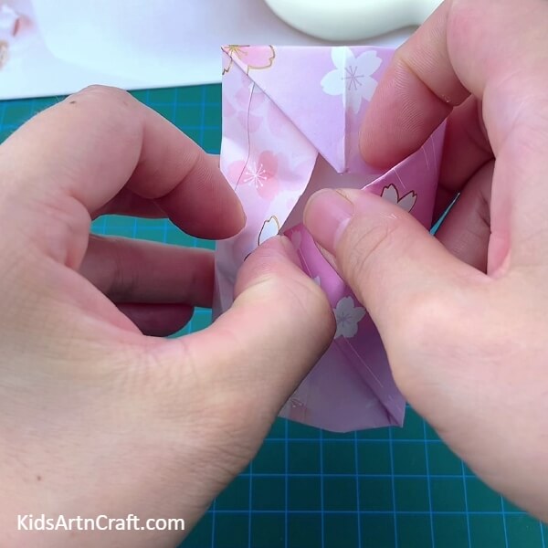 Inserting The Folded Triangle Inside The Envelope- Learn to Make an Origami Envelope with Paper 