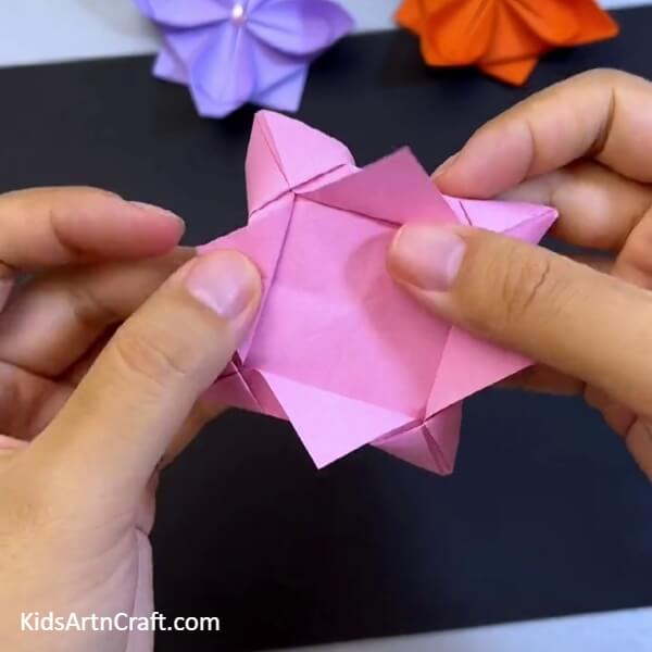 Opening The Underside Folds- Step-by-Step Instructions on How to Create a Square Origami Lotus