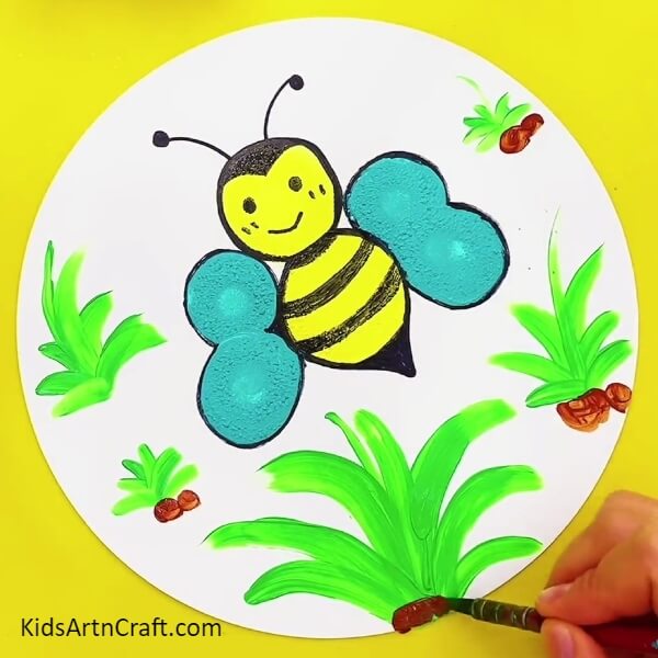 Paint the ground for the green plants- Follow the Steps to Making Paint Stamping Bee Art