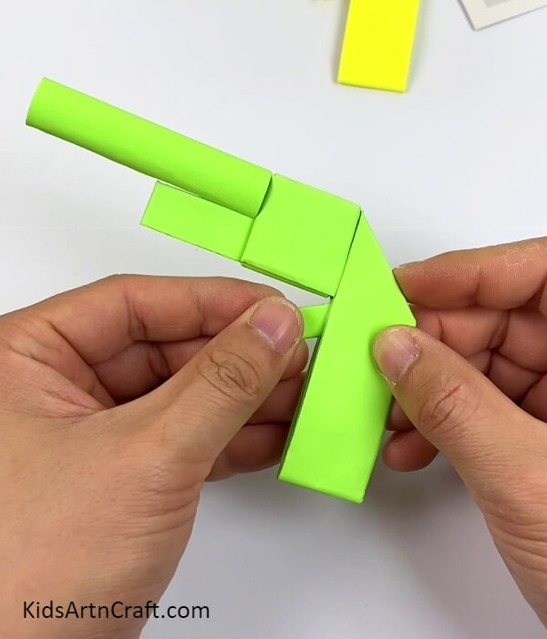 Making And Inserting A Strip In The Gun Base-How to Design a Simple Gun For Kids