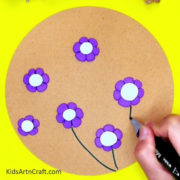 Drawing Flower Stems- A decorative clay flower and bee project for the novice. 