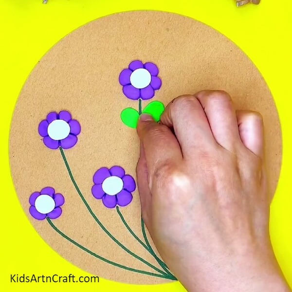 Making Leaves Of The Flowers- Decorative clay flower and bee concept for starters. 