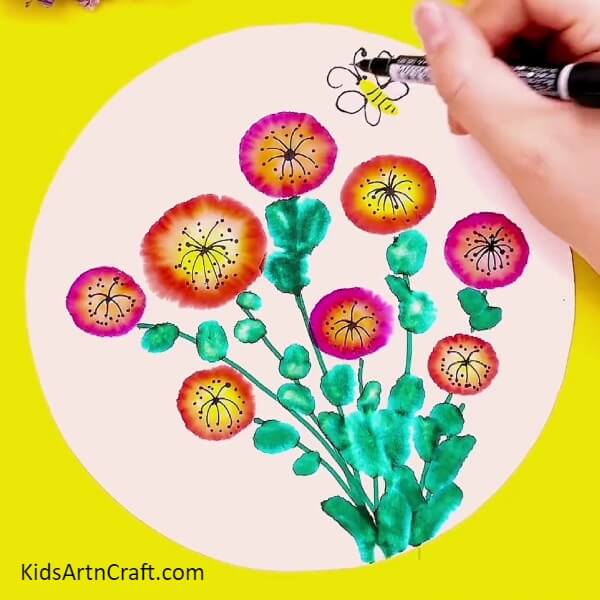 Drawing The Wings And The Antenna-A creative project for kids to make a flower garden painting with sketch pens