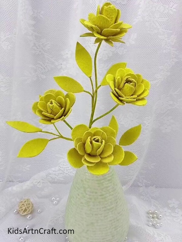 Placing The Flowers In A Vase-Making a beautiful rose sculpture from an egg carton