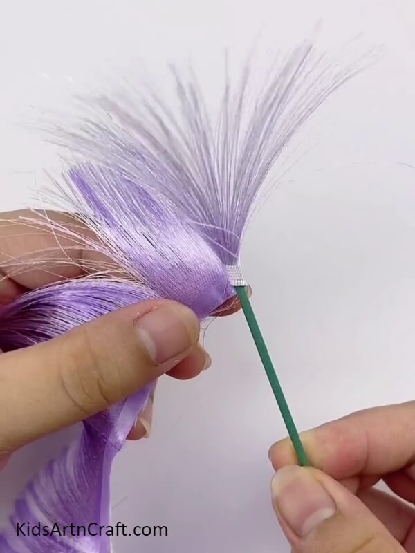 Pasting Fringes With The Wood Stick- Showing Kids How To Build A 3D Purple Pampas Grass With Ribbon