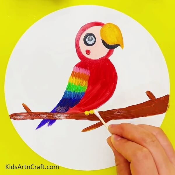 Making Parrot's Legs - A simple tutorial to teach kids how to paint a rainbow parrot.