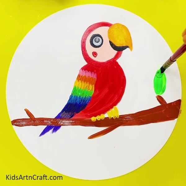 Making Leaves - An instructional guide to help kids paint a rainbow parrot.