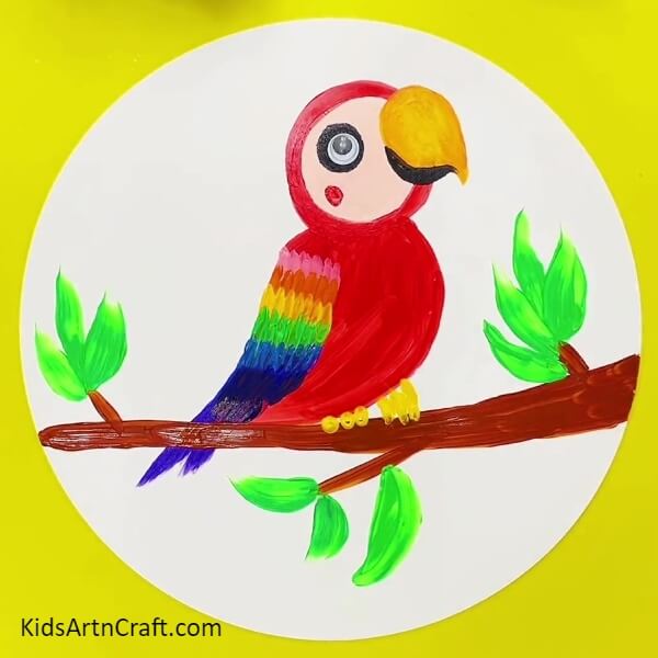 The Final Look Of Your Parrot Art! - A tutorial for kids to make a rainbow parrot painting.