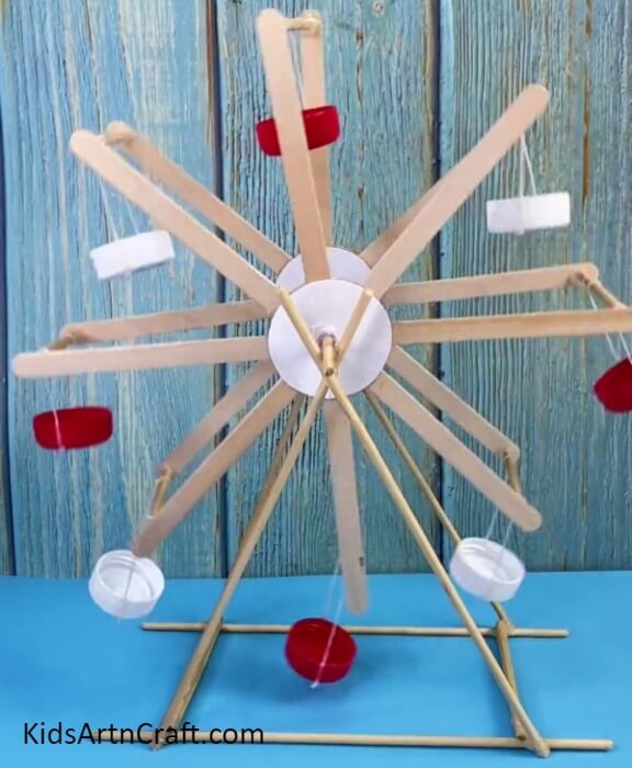 The Final Look Of Your Ferris Wheel!-An Artistic Project for the Kids: A Ferris Wheel Using Reused Sticks and Bottle Caps