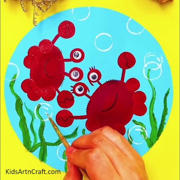 Detailing The Bubbles-A Guide to Painting Red Crabs Submerged in Water for Children 