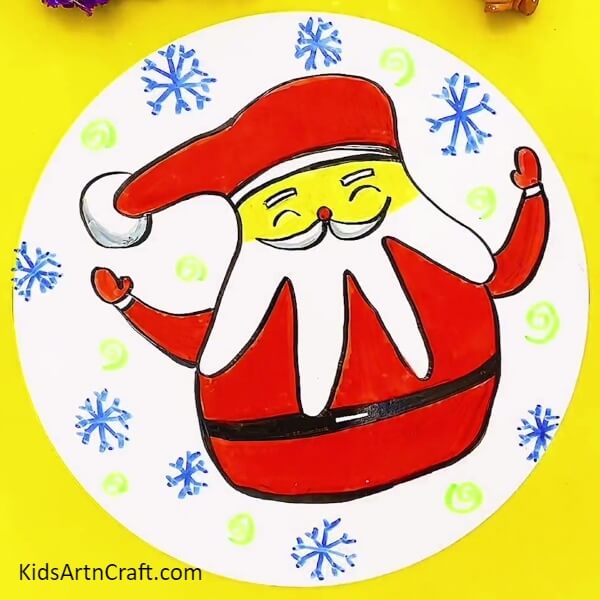 Detailed instructions on how to create a Santa drawing with a hand outline