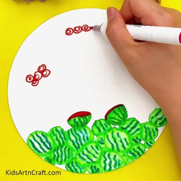 Making Spirals Out Of  Sketch Pen, Similar To The Green Ones- A guide to help young artists draw a watermelon with ants step-by-step