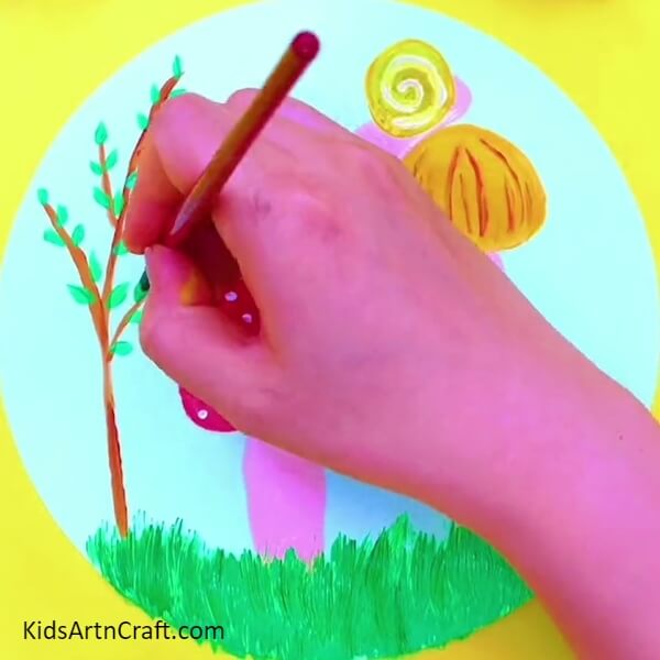 Add Leaves To The Plant- A Guide For Kids To Make Snails Over Mushrooms Art