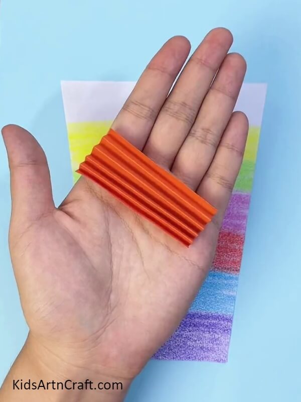Folding The Orange Paper- Summertime Crafts with Paper and Fruit Drinks for Kids 