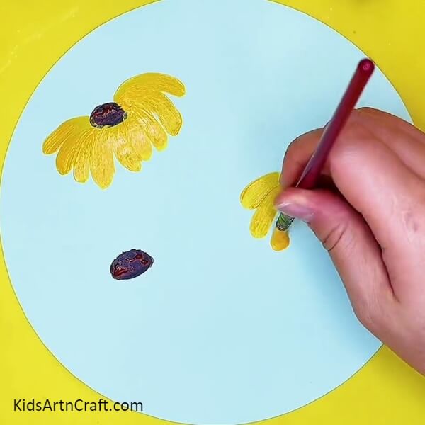 Making Sunflower Petals-Creating a sunflower garden painting by following a step-by-step tutorial.
