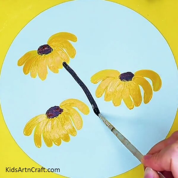 Making Stems Of The Flowers-Learn to paint a sunflower garden with this step-by-step guide.