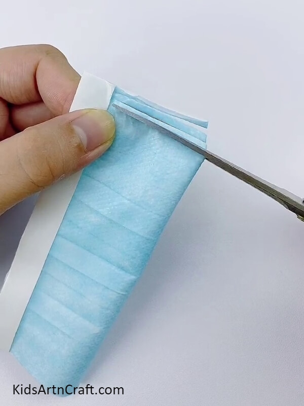 Cut Narrow Strips With Scissors- Crafting Surgical Mask Flowers - A Tutorial for Beginners 