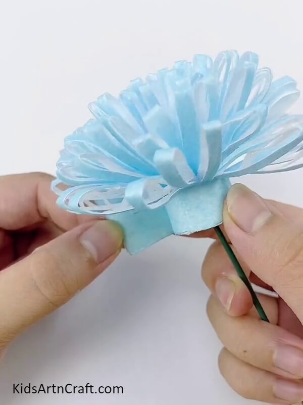 Wrap The Green Stem With A Surgical Mask- Master the Art of Crafting Surgical Mask Flowers - A Tutorial for Newbies 