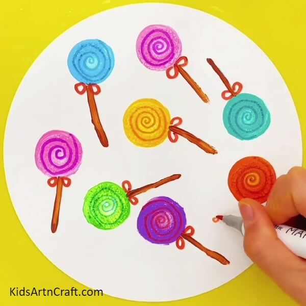 Making Colorful Spirals-Crafting Sweet Lollipop Art For Children