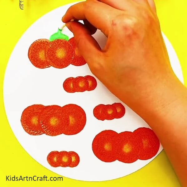 Making The Stem Of The Capsicum- A Step-by-Step Guide to Making Red Capsicum Paint Art