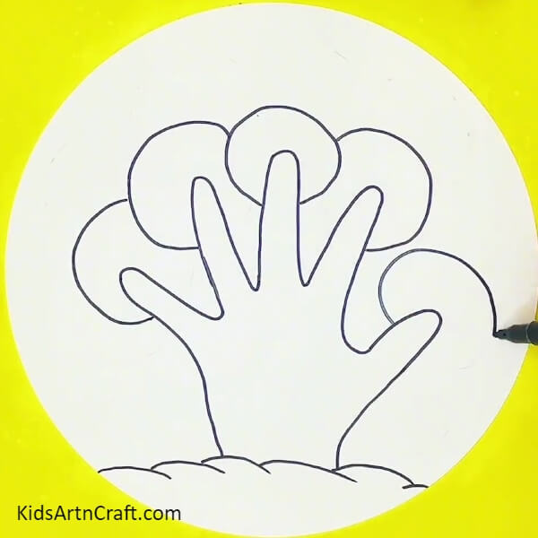 Make circles around fingers with blue marker/sketchpen- Learn how to make a tree shape with a hand outline step-by-step