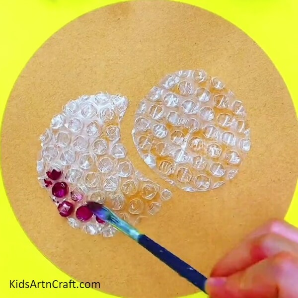 Painting The Bubble Wrap- A Creative Way to Use Bubble Wrap and Pomegranates in a Basket