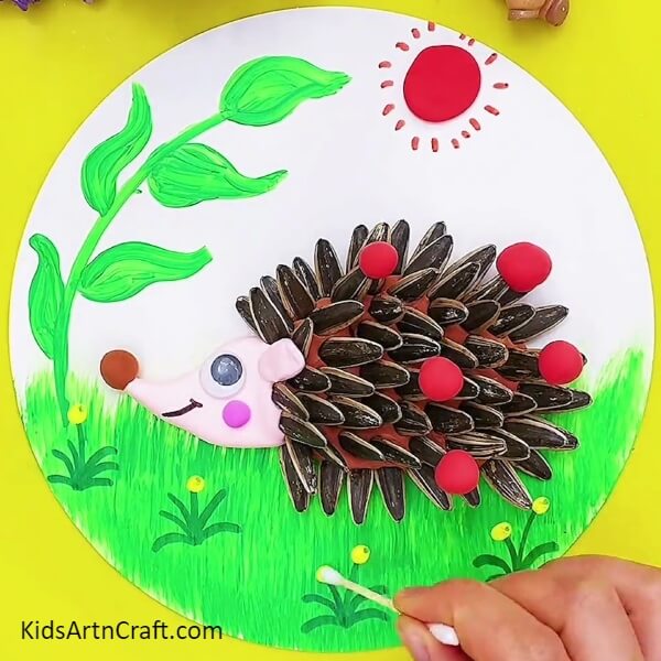 Final Touch-up- A handmade hedgehog crafted from clay and sunflower seeds, perfect for kids.