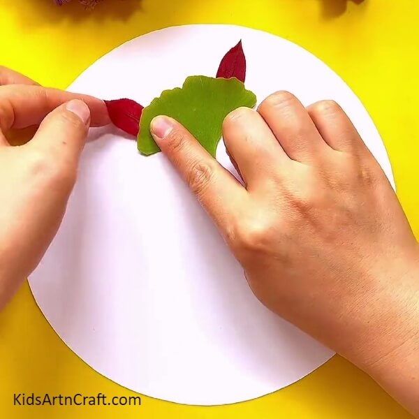 Placing The Smaller Leaves-Creating a leaf fox craft - a great idea for those just starting out.