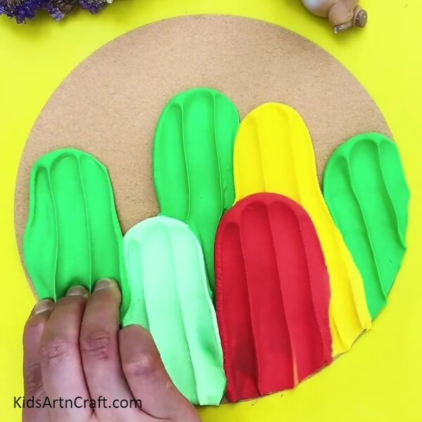 Making More Cactus With Different Color Modeling Clay- Utilizing vivid clay to design a vivid cactus for kids