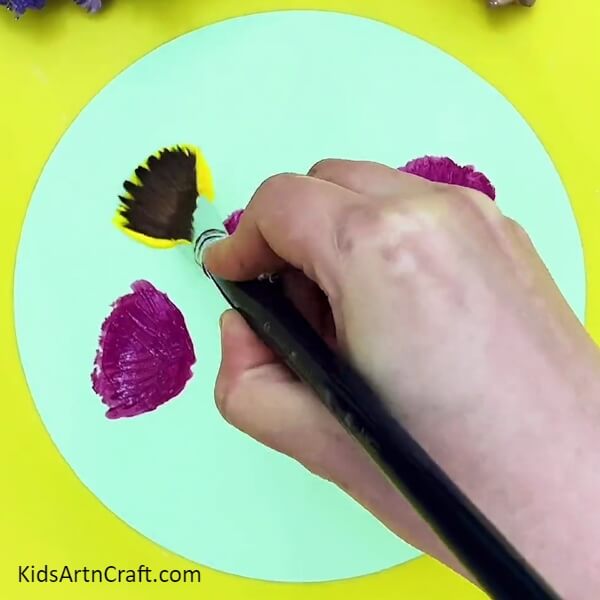 Making yellow flower base. Tutorial of making Watercolor Drawing Of Flowers And A Butterfly For Kids