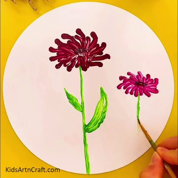 Drawing The Stem Using A Paintbrush-A Unique Creative Painting Project For Kids Featuring Wobbly Flowers 