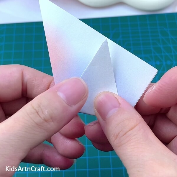 Taking One Unopened Corner To The Crease - A scrumptious Lollipop Paper Origami thought for newbies 