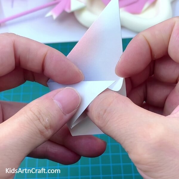 Inserting The Opened Corner - A yummy Lollipop Paper Origami suggestion for beginners 