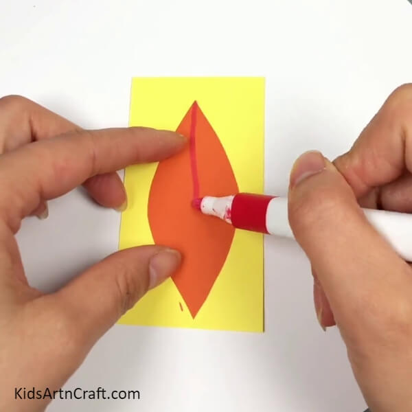 Detailing The Petal- Get step-by-step instructions on how to create a 3D Lily Paper Flower with this tutorial for children.