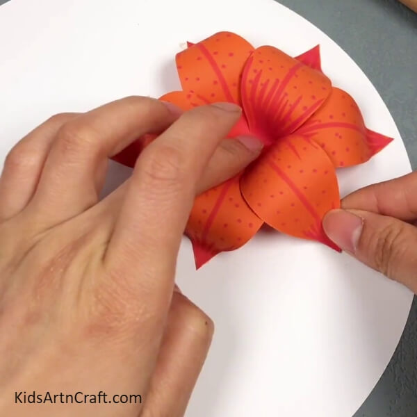 Forming A Flower-Children can make their own 3D Lily Paper Flower with this easy-to-follow tutorial