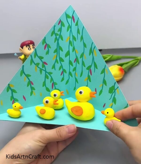 Adding More Ducks To The Swamp Base- Three-dimensional swamp featuring ducks - a simple craft guide for children 