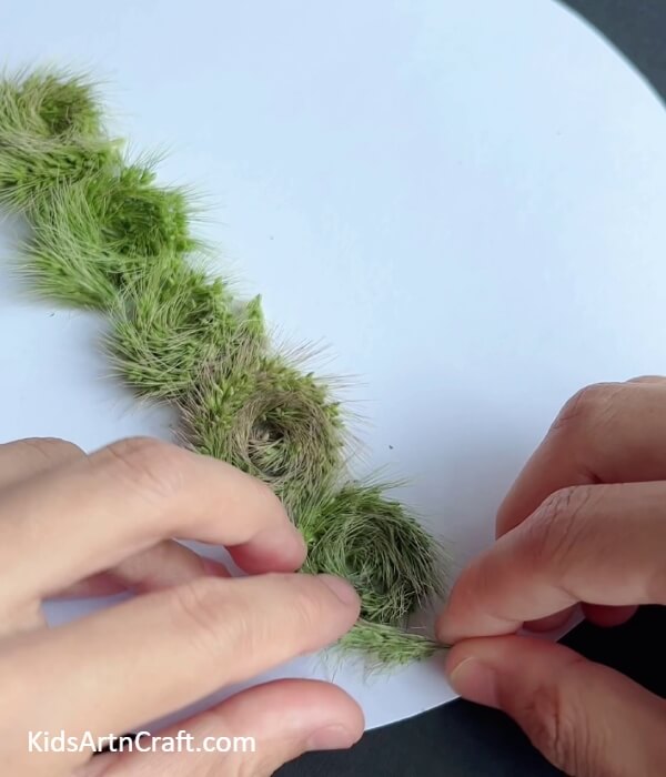 Making More Spirals- Tutorial on Crafting a Synthetic Grass Strip Worm for Little Ones