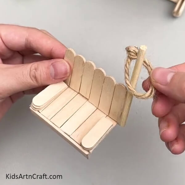 Inserting A Rope Loop-Splendid Swing Creation Tutorial With Popsicle Sticks For Youngsters