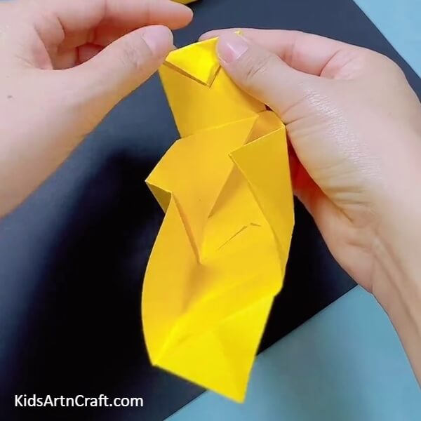 Folding The Sharp End- Constructing a Bulldozer Out of Origami Paper for Children