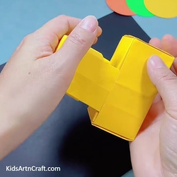 Placing The Square Box Over The Enclosed One- Learn How to Create a Bulldozer Out of Paper for Kids 