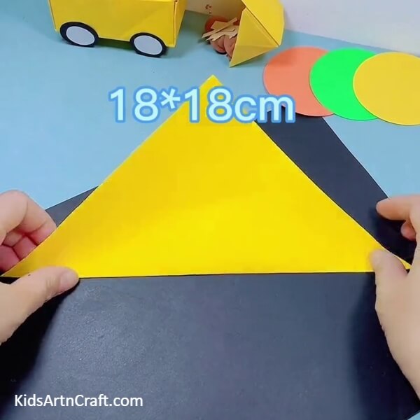 Making 'X' Creases- This tutorial for youngsters will show you how to construct a bulldozer out of origami paper
