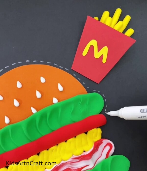 Outlining The Burger- Explaining to children how to make a McDonald's burger and fries with paper and clay 