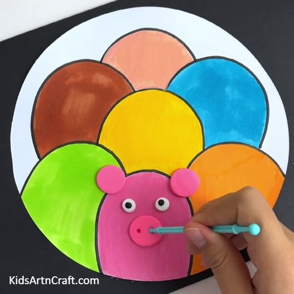 Making The Nostrils Of The Pig- Crafting Cute Animal Art Projects with Kids 