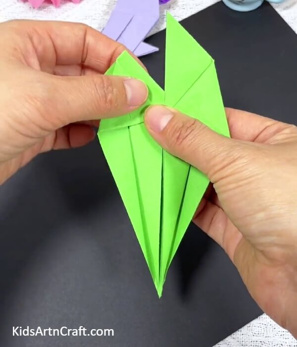 Folding The Left Diamond Partition-Teaching kids how to create origami parrots