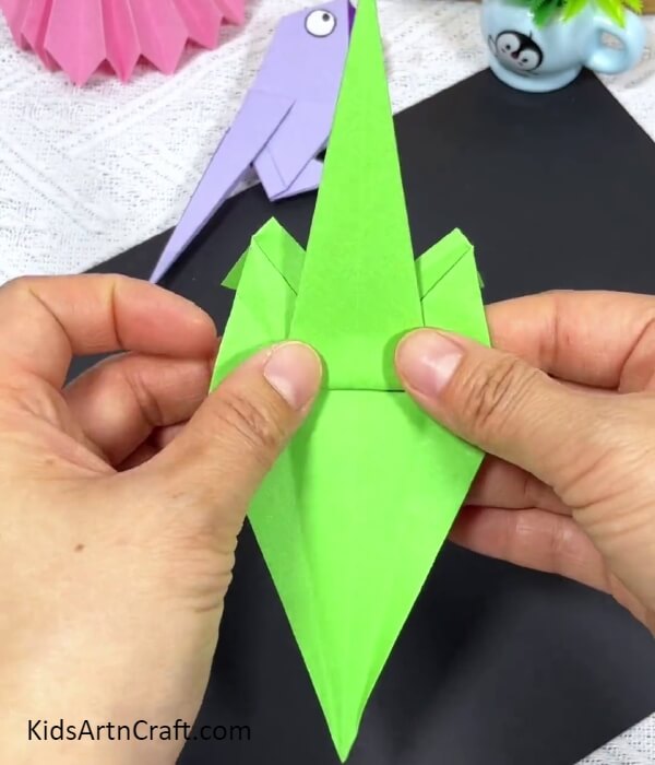 Folding Upward A Long Triangle-Guide to making an origami parrot with kids