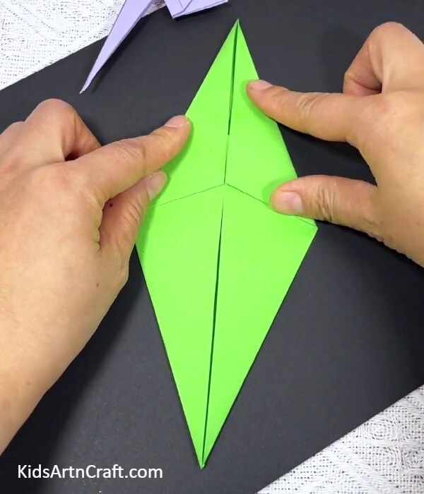 Making A Diamond Shape-Step-by-step instructions for making an origami parrot for youngsters