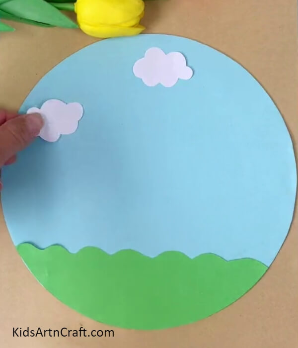 Adding Clouds To The Base- Learn how to construct a paper kite with this kid-friendly guide. 