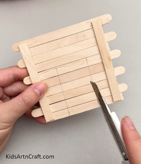 Carving Out A Gate- Making a Mini Home with Popsicle Sticks: A Guide for Children
