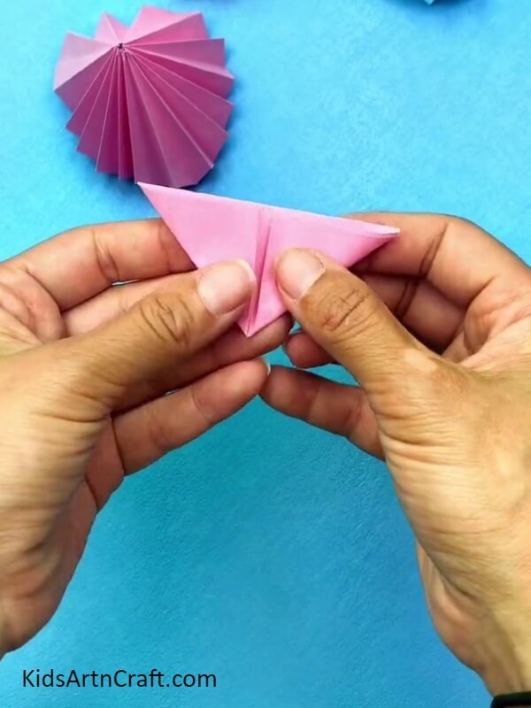 Forming A Triangle- Crafting an origami gown with a little help for the kids